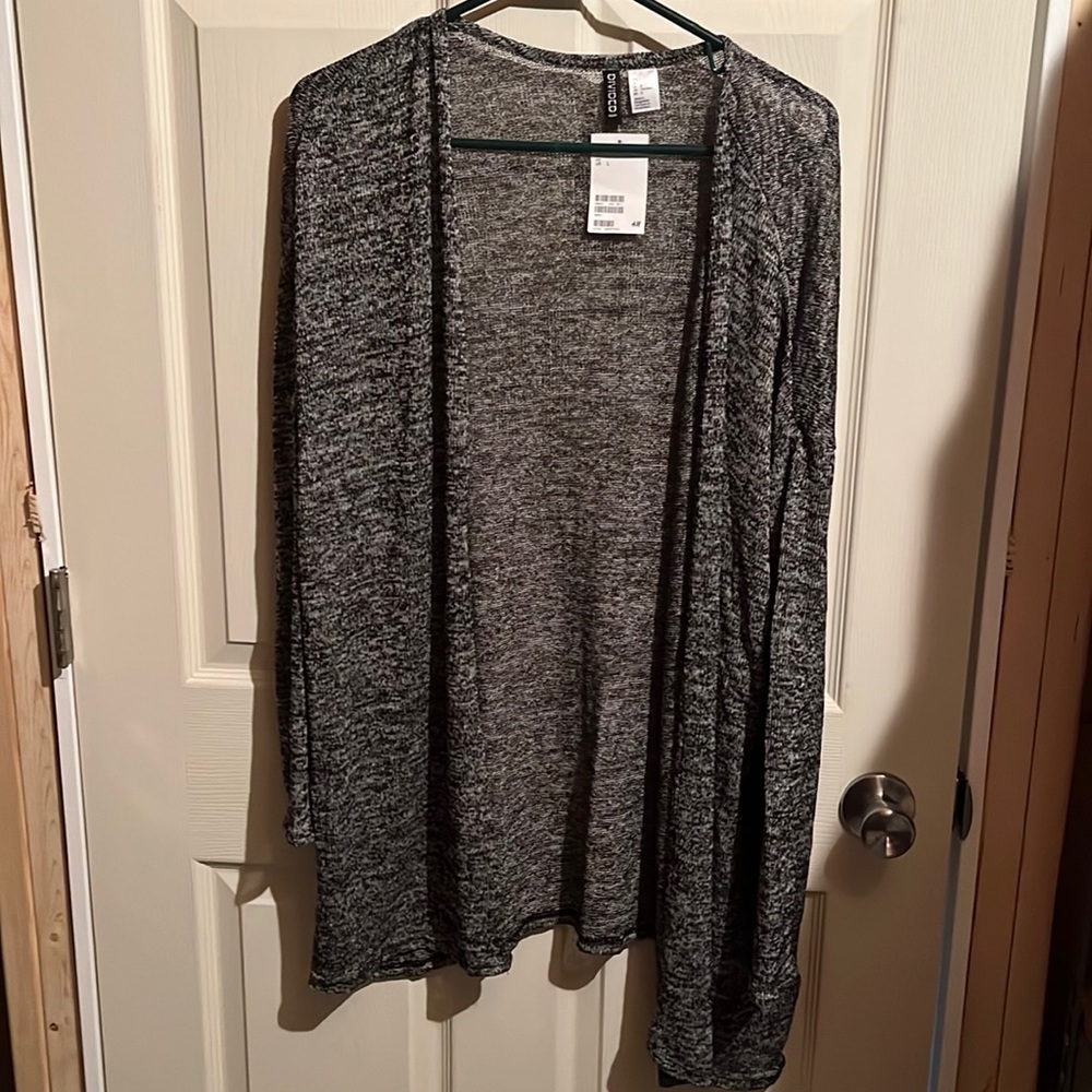 Brand new size large women’s cardigan